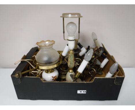 A box containing continental brass light fittings, wall lights, marble table lamp etc