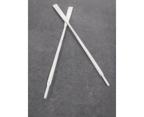 A pair of vintage wooden boat oars 