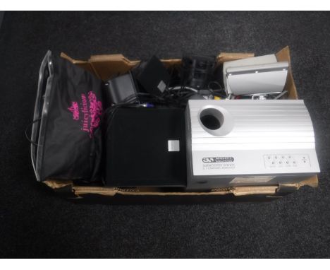 A box of two PC surround sound speaker sets, Tom Tom sat nav 