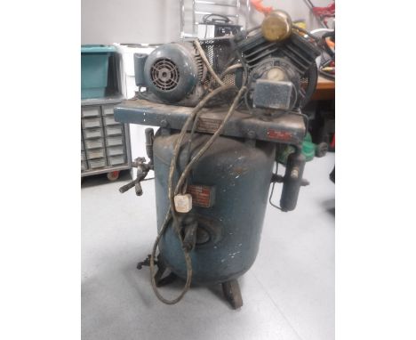 A vintage industrial air compressor 