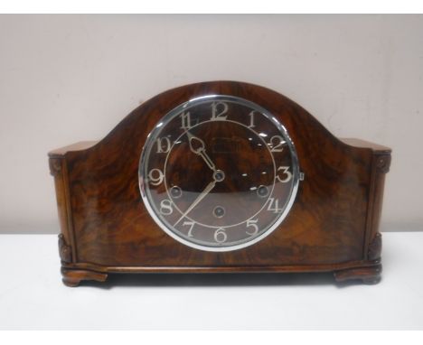 A walnut cased Westminster chime mantel clock