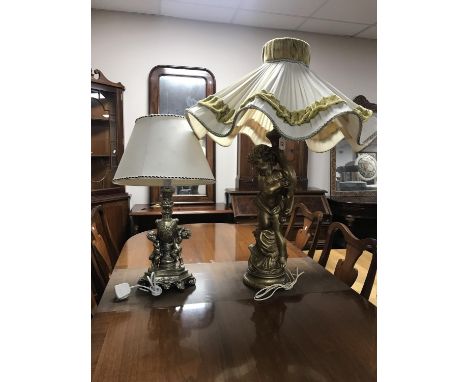 A figural chalk table lamp of a cherub plus another similar with shade  