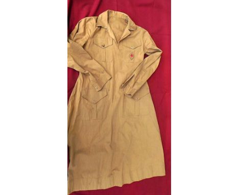 A vintage Boy Scout leaders uniform dress. Badges state 1st Hambridge and Boy Scouts also with pin badge on breast pocket