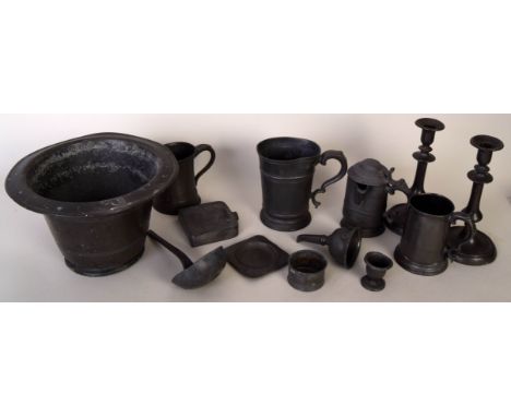 A collection of 19th century pewter domestic wares including a conical bucket, a William IV lidded jug, a pair of Victorian c