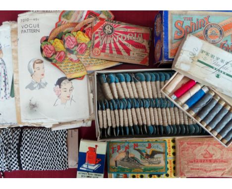 A large mixed lot of vintage sewing accessories much still in original packaging and dating from, early 1900s. Lot includes b