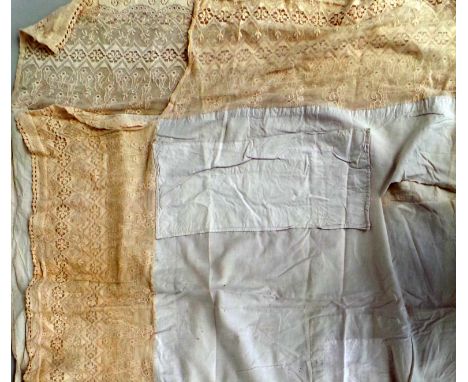 A vintage single lace valance sheet and a fine cotton muslin and lace tablecloth. (2)