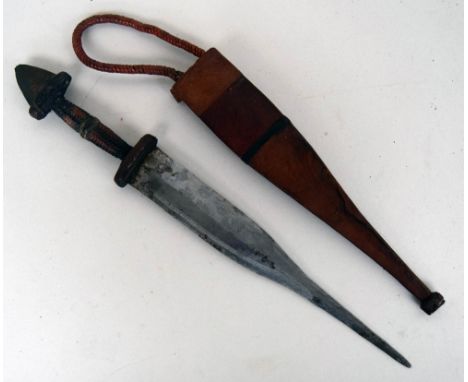 An eastern dagger with woven red and black leather hilt and red and brown leather scabbard, 37cmL