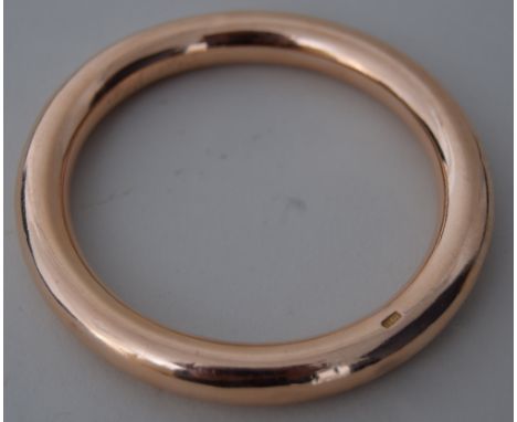 A gold plain circular bangle, late 19th/ early 20th century, marked 10ct, 6.5cmD, 0.71oz