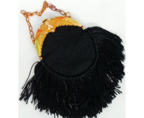 Two vintage evening purses. A black French crocheted and tasselled evening bag with a moulded early plastic fastening and cha