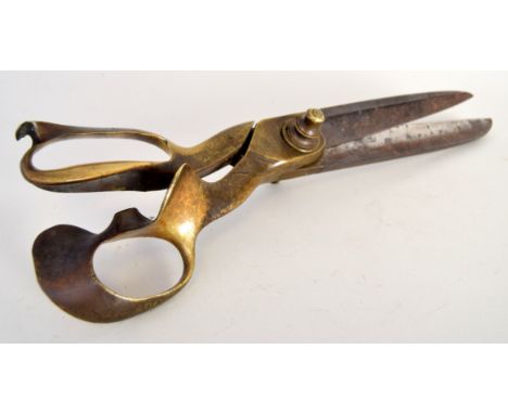 A pair of late Victorian steel end brass 14 inch drapery scissors by Wilkinson & Co., in good condition
