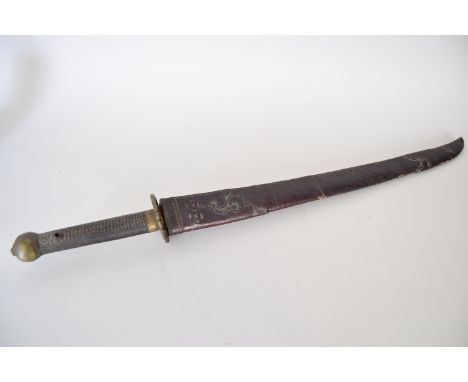 A Japanese sword with a brass and leather hilt complete with a leather scabbard, three Japanese characters engraved on the ri