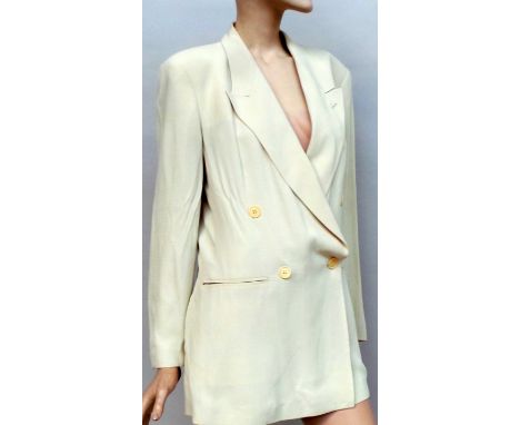 A cream 1980s/90s Emporio Armani fitted double breasted jacket with double back vent, approximate size 12. Good vintage condi