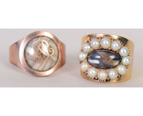 An early Victorian yellow metal seed pearl and hair mourning ring, engraved 'Thomas and Mary Phillips, died 1811 and 180?, ag