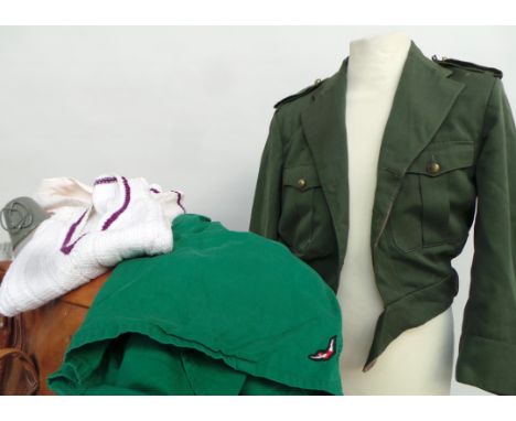 A mixed lot of gent's vintage clothing items to include a Spanish military jacket, a sailor top, military knitted socks, a Lo