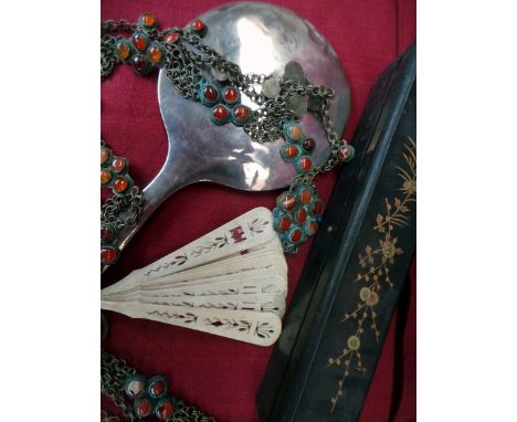 Three vintage fans, a North African chain belt and a silver (no hallmark) backed hand mirror. A lacquered box containing a bo