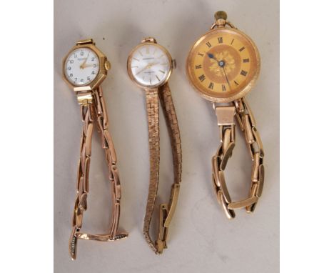 An early 20th century Swiss gold ladies pocket watch adapted as a wrist watch on a yellow metal strap, together with a Garrar