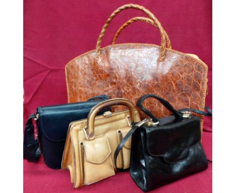 Three vintage handbags and a large skin tote bag. A small black leather Russell and Bromley box bag with long shoulder strap,