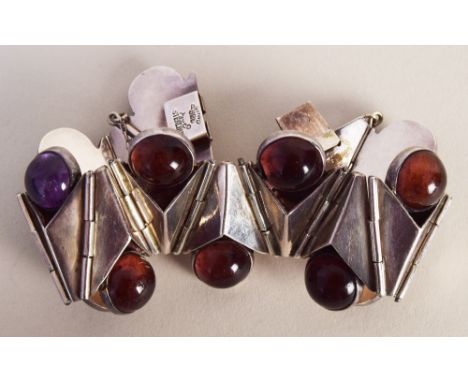 A mid-20th century sterling silver and cabochon amethyst ladies bracelet of hinged geometric form, stamped 'Patino Taxco 925 