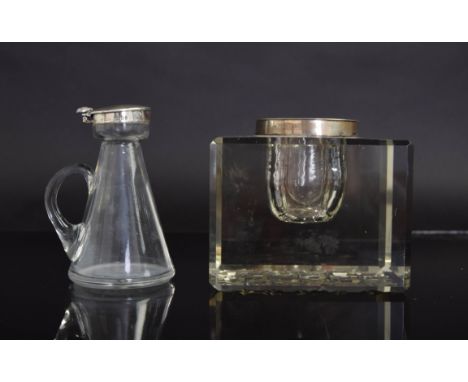 An Art Deco silver and glass inkwell, Asprey & Co. Ltd, Birmingham 1928, large square glass body with silver lid engraved wit