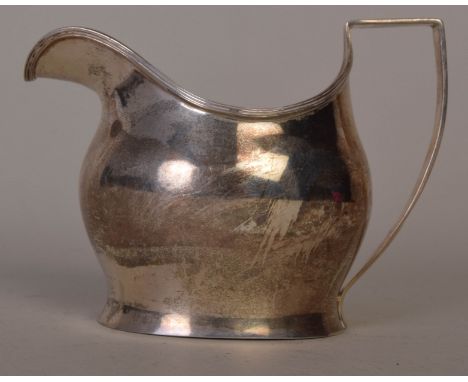 An Art Deco 1930s silver gravy boat with reeded border and angular handle, Chester 1932, 6.63oz