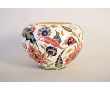 A Zsolnay Pecs jardinière in the Persian style decorated with stylized flower heads enriched in gilt, 18cmH