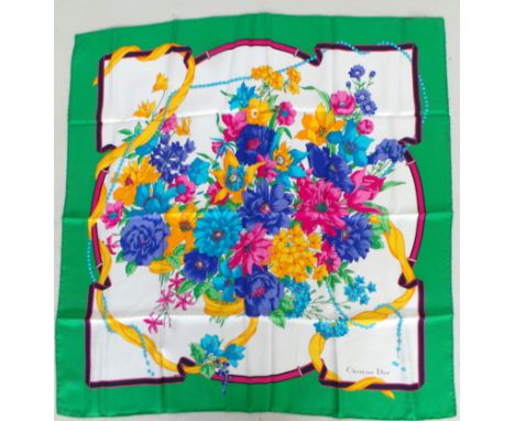 A vibrant floral 'Christian Dior' silk scarf with hand-rolled edges. Lovely condition throughout. Measures 33" x 33"