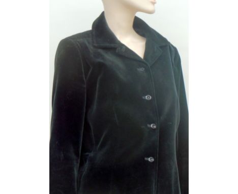 A vintage black velvet 'Jaeger' short fitted jacket size 10/12 and a further plum, fitted velvet jacket labelled 'Dickens and