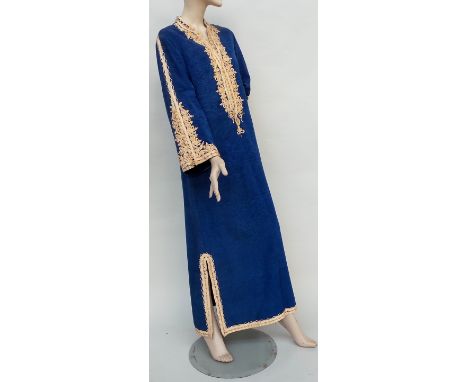 A hand-made Egyptian kaftan in blue silk water tafetta. The garment has been beautifully finished with hand-stitched cream go