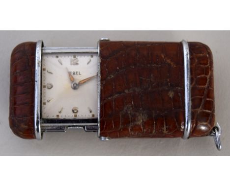 An early 20th century Swiss-made Ebel slide-wind hermetic watch, with white enamel square dial featuring Arabic numerals, hou