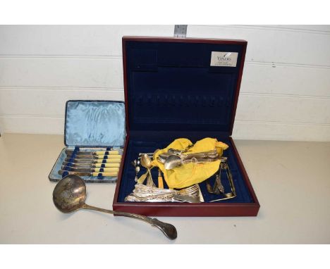 A quantity of silver plate flatware to include a ladle and other items