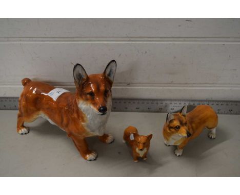Royal Doulton model corgi together with two other smaller