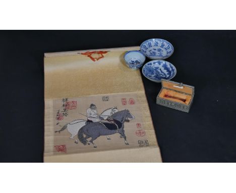 A Chinese embroidered scroll, three items of hand painted blue and white ceramics and a cased carved soapstone seal. H.57 W.3