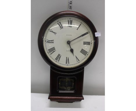 A vintage battery powered wall clock 