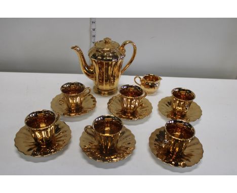 A vintage Wade gold plated coffee set 