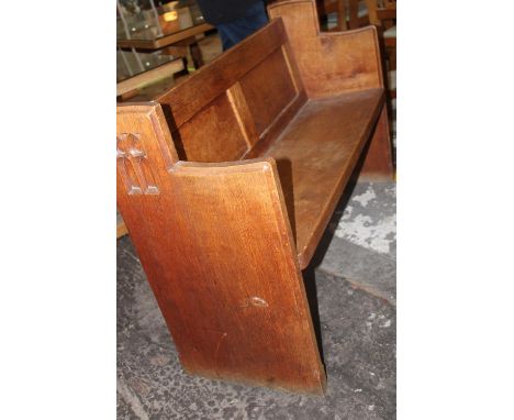 A vintage Robert 'Mouseman; Thompson of Kilburn hand carved church pew/bench with carved mouse to one side, with Gothic arch 