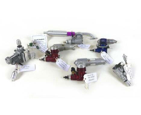 A group of seven model boat and aeroplane engines, comprising a SC 40 boat engine, Irvine S3 Two Stroke, OS FS Series Four St
