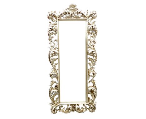 A large modern easel mirror, with scrolling foliate silvered frame, and rectangular mirror plate, 83 by 20 by 194cm high.
