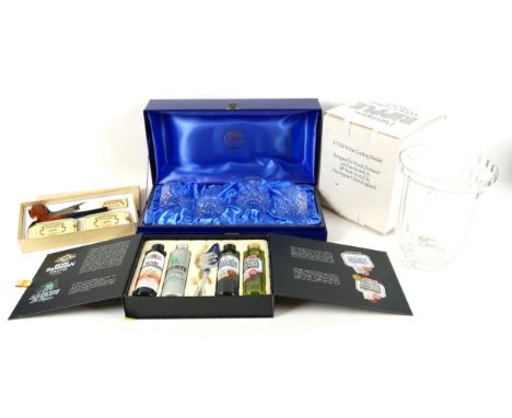 A Dartington glass wine cooling bucket, model FT336, boxed, a set of four Thomas Webb cut crystal tumblers, boxed, a boxed gi