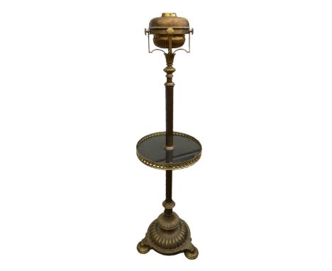 A smoker's brass standard lamp, with 'Messenger's Patent' reservoir (missing burner) to the top, reeded column with circular 