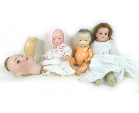 A collection of Armand Marseille dolls, comprising a bisque head oriental baby, #353, with impressed marks '0, Germany' to th