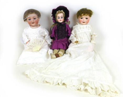 A collection of 20th century German dolls, comprising a Simon &amp; Halbig bisque head doll, 126 head stamp, painted brows an