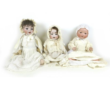 A group of three vintage German dolls, including, an Armand Marsielle 'Dream Baby' bisque head doll, stamped 351/7K, brown sl