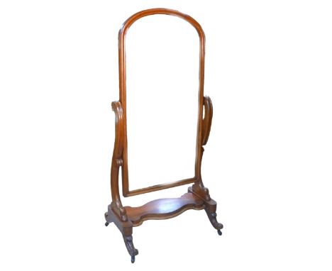 A Victorian mahogany framed cheval mirror, raised upon castors, 82 by 57 by 170cm high. 