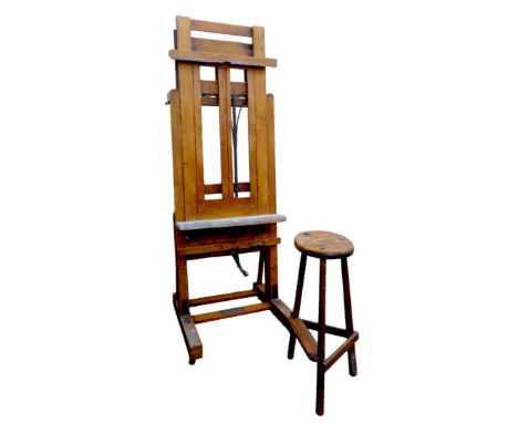 A large oak Windsor & Newton ‘Improved Studio Easel’, circa 1910, with metal fittings, dual action brass crank wheel, raised 