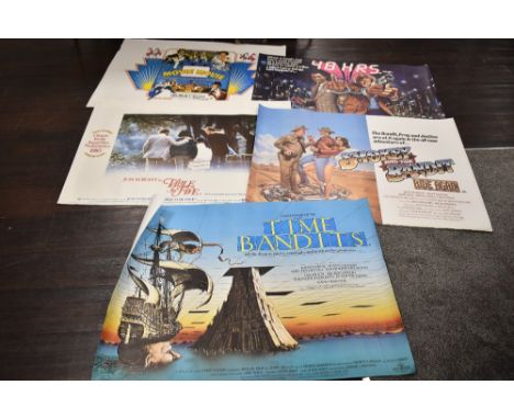 Five genuine vintage film quad posters of comedy and action interest including Time Bandits and Smokey and the Bandit ride ag