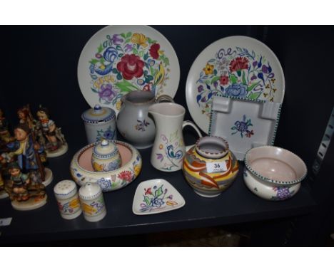 A selection of vintage mid century pottery by Poole in various designs