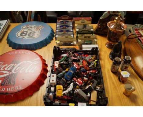 A collection of diecast model vehicles, some boxed