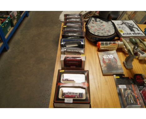 A collection of boxed diecast model vehicles