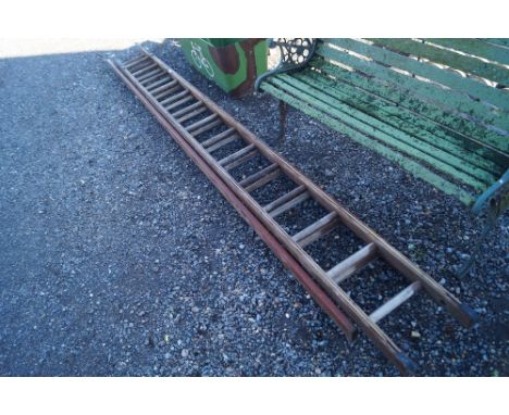 A wooden extending ladder