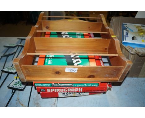 A wooden spice rack; a Backgammon game; a spirograph; Monopoly game and Masterpiece The Art Auction game